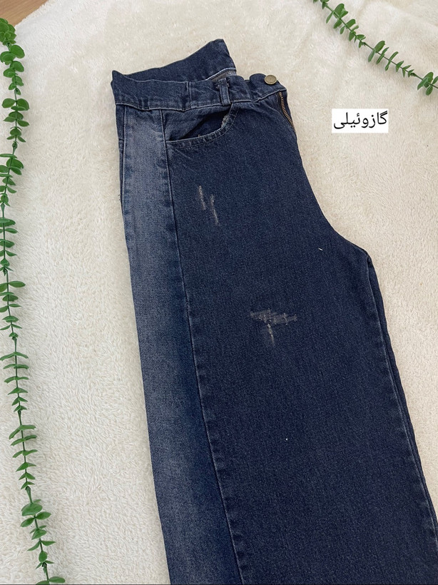 نمای نزدیک شلوار جین شافل زنانه جین ترک رنگ گازوئیلی
